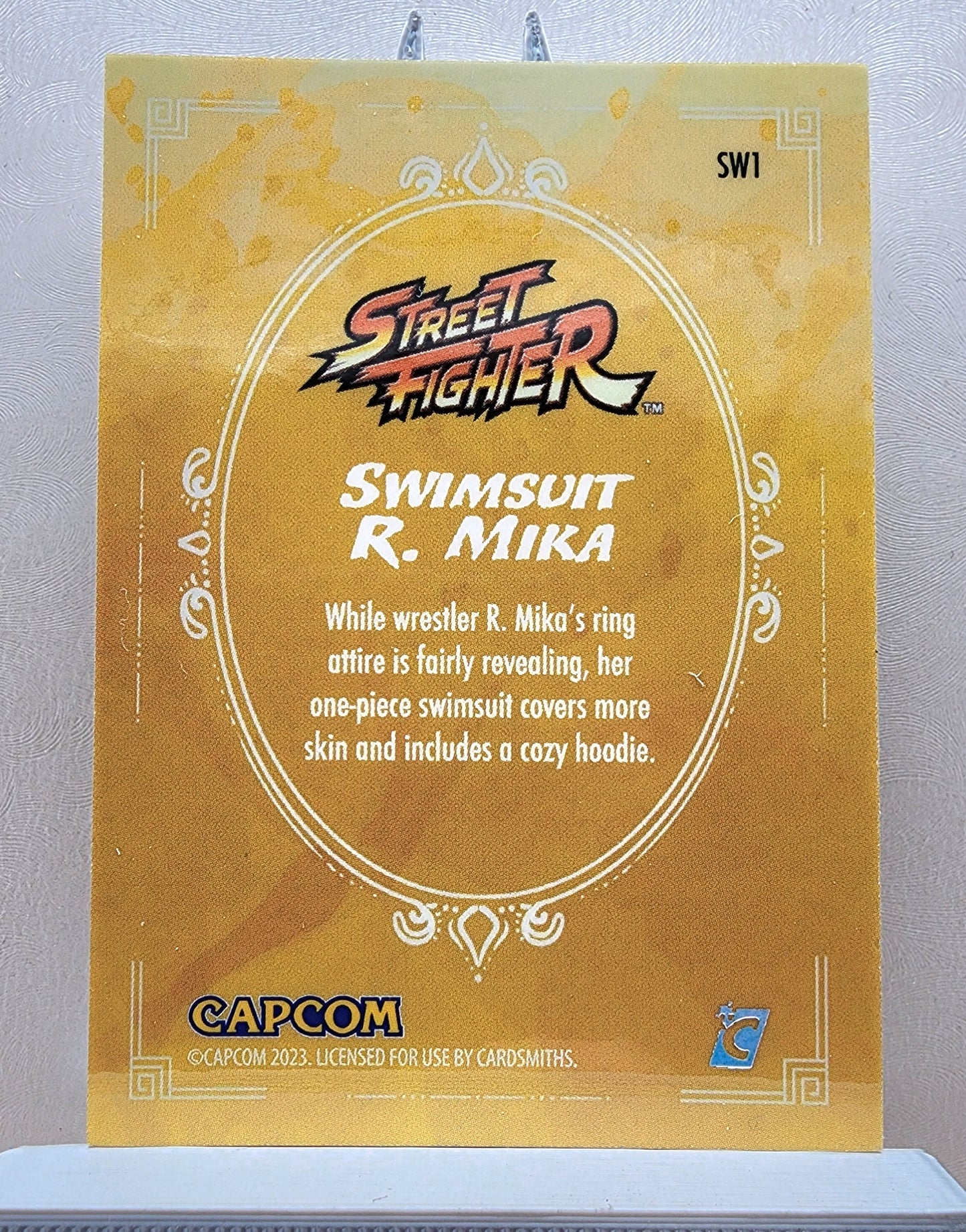 Street Fighter! 1x Swimsuit R Mika - Holofoil Insert (#SW1 - 2023 Cardsmiths Street Fighter Series One)