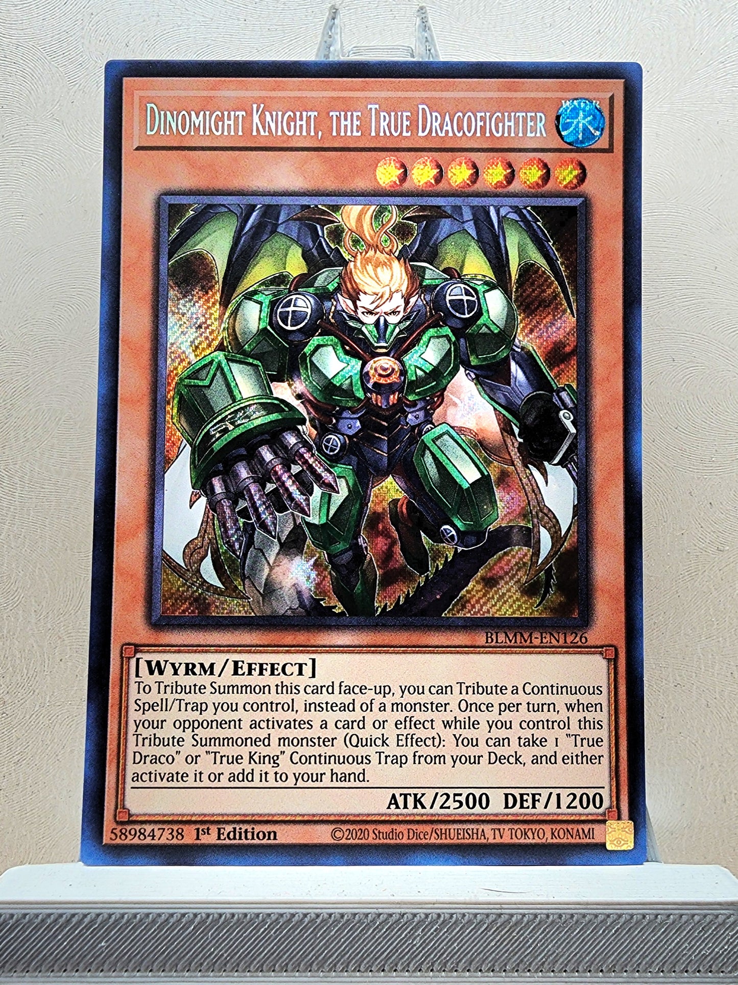 Yugioh! 1x Dinomight Knight, the True Dracofighter (BLMM - Secret Rare) 1st Edition