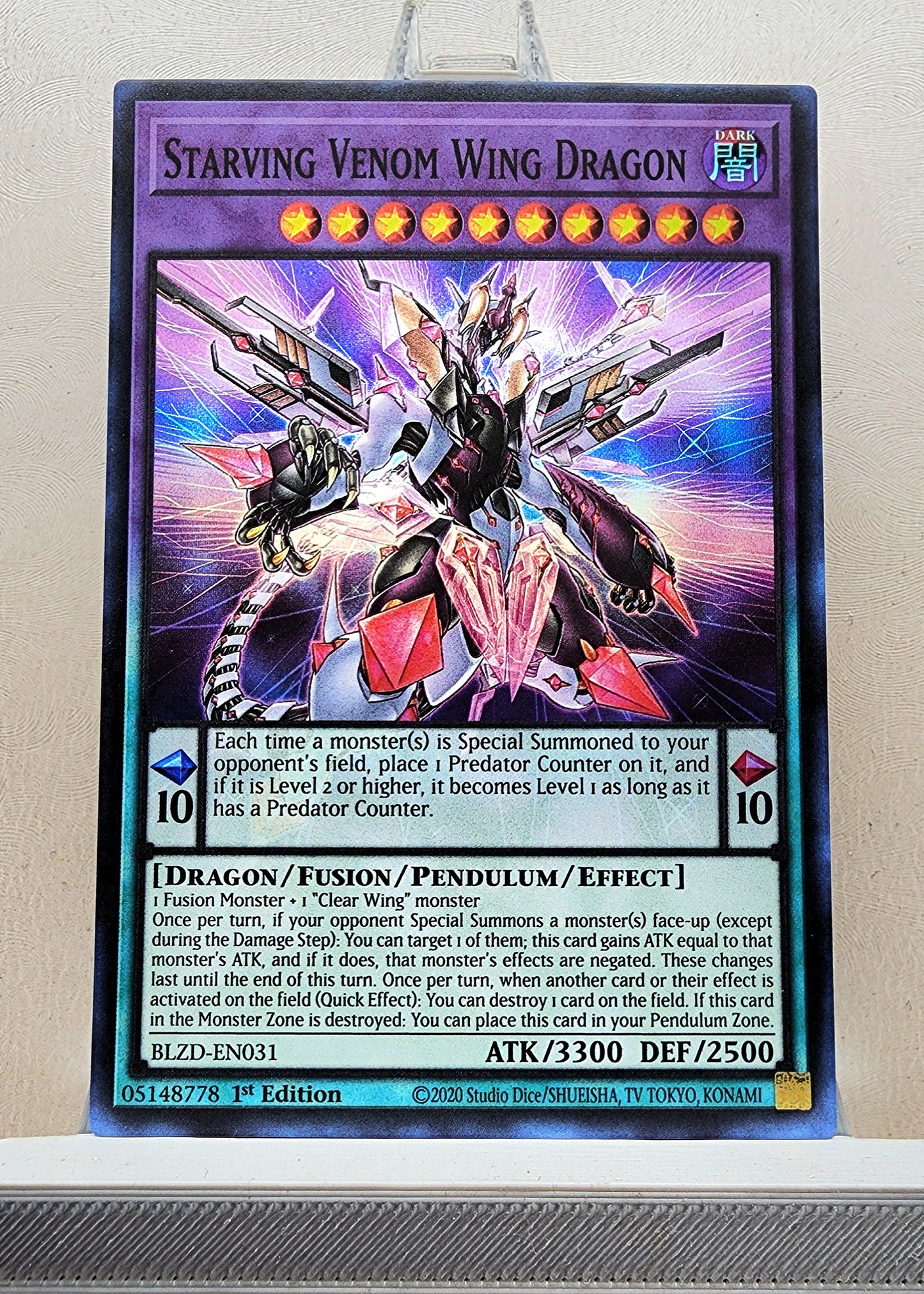 Yugioh! 1x Starving Venom Wing Dragon (BLZD - Super Rare) 1st Edition