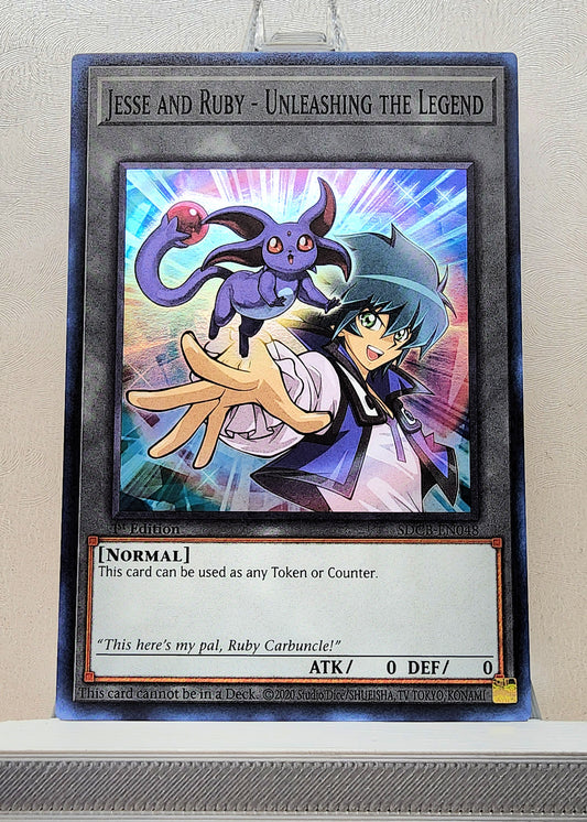 Yugioh! 1x Jesse and Ruby - Unleashing the Legend Token (SDCB - Super Rare) 1st Edition