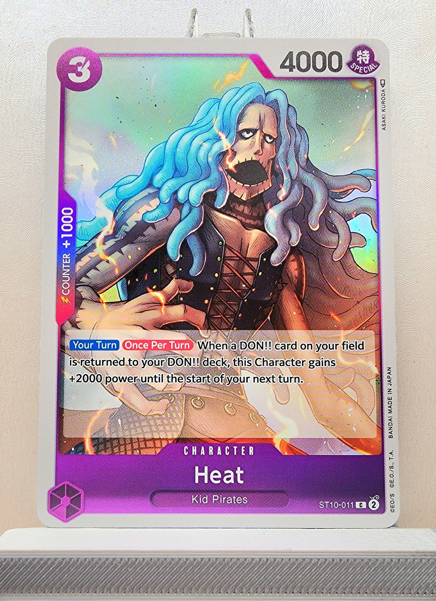 One Piece English! 1x Heat (ST10-011 - Common: Foil)