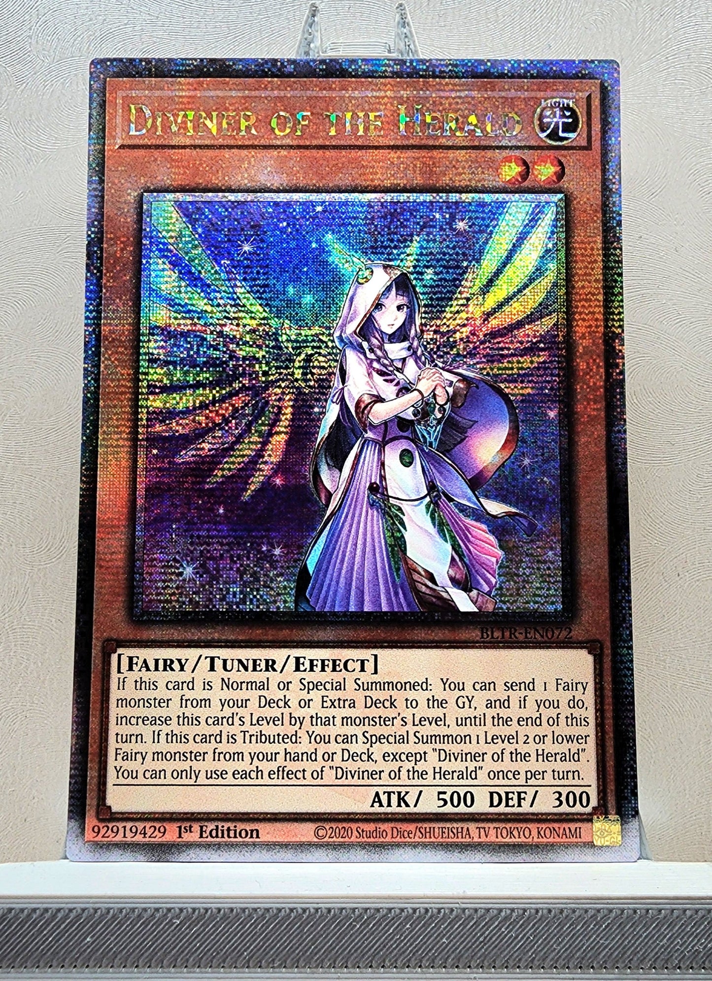 Yugioh! 1x Diviner of the Herald (BLTR - Quarter Century Secret Rare) 1st Edition