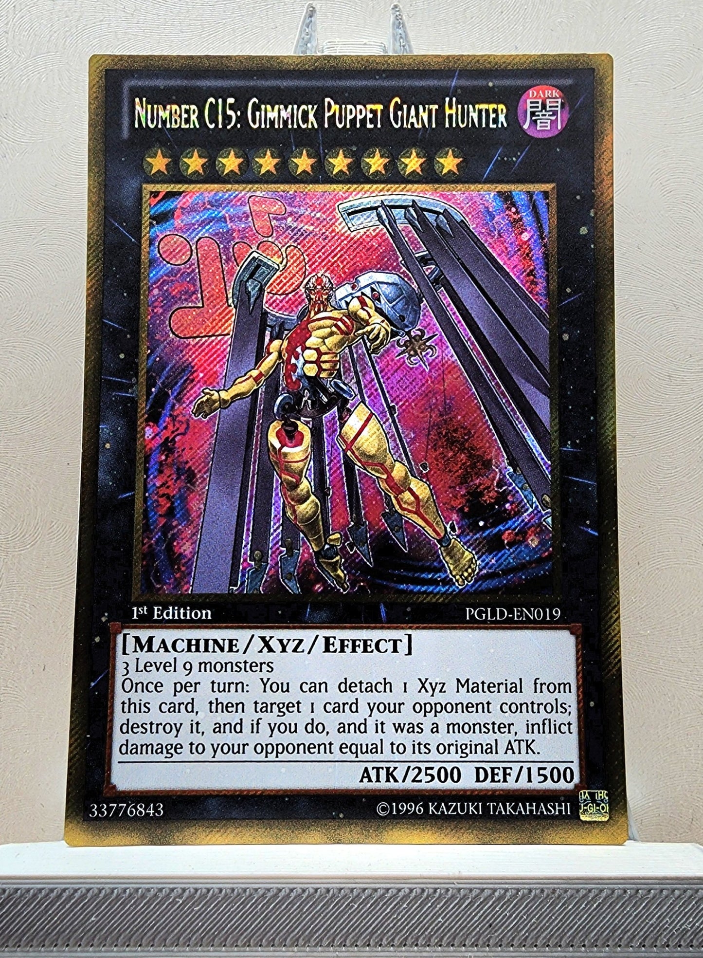 Yugioh! 1x Number C15: Gimmick Puppet Giant Hunter (PGLD - Gold Secret Rare) 1st Edition