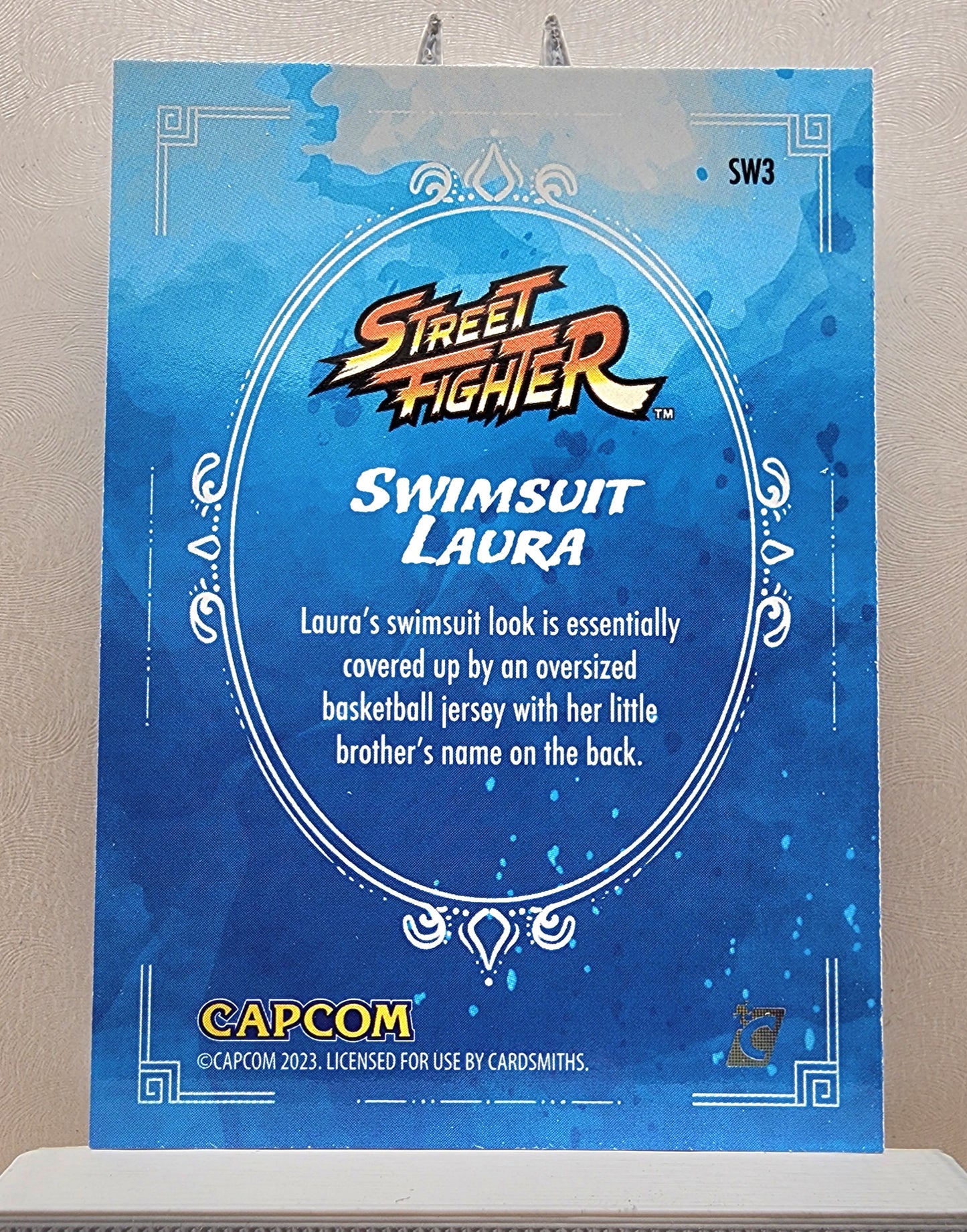 Street Fighter! 1x Swimsuit Laura - Insert (#SW3 - 2023 Cardsmiths Street Fighter Series One)