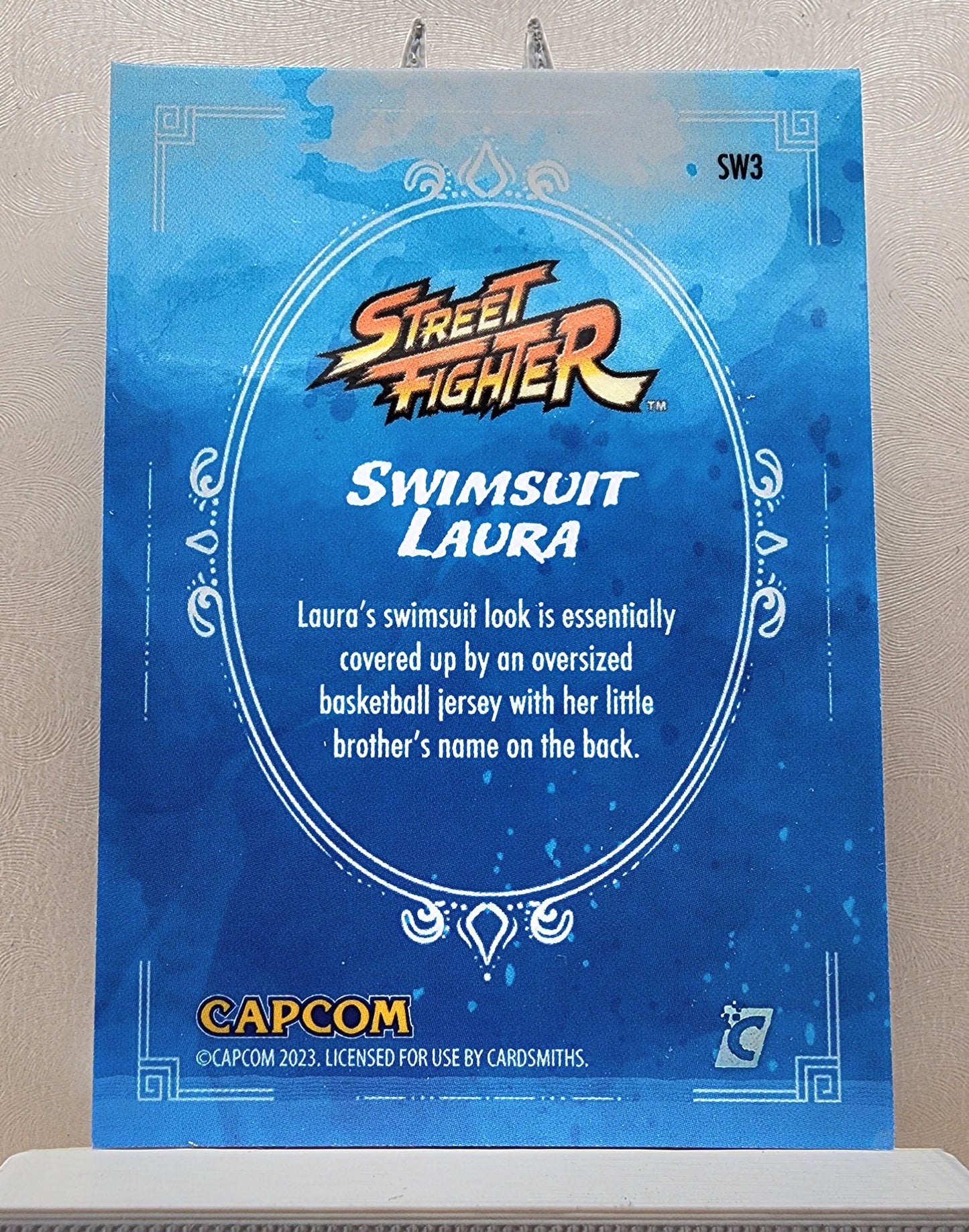 Street Fighter! 1x Swimsuit Laura - Holofoil Insert (#SW3 - 2023 Cardsmiths Street Fighter Series One)