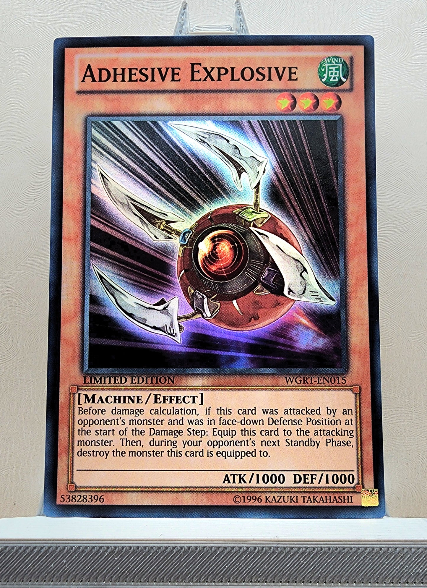 Yugioh! 1x Adhesive Explosive (WGRT - Super Rare) Limited Edition