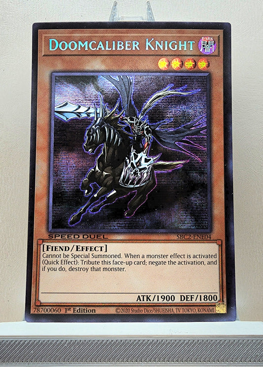 Yugioh! 1x Doomcaliber Knight (SBC2 - Prismatic Secret Rare) 1st Edition