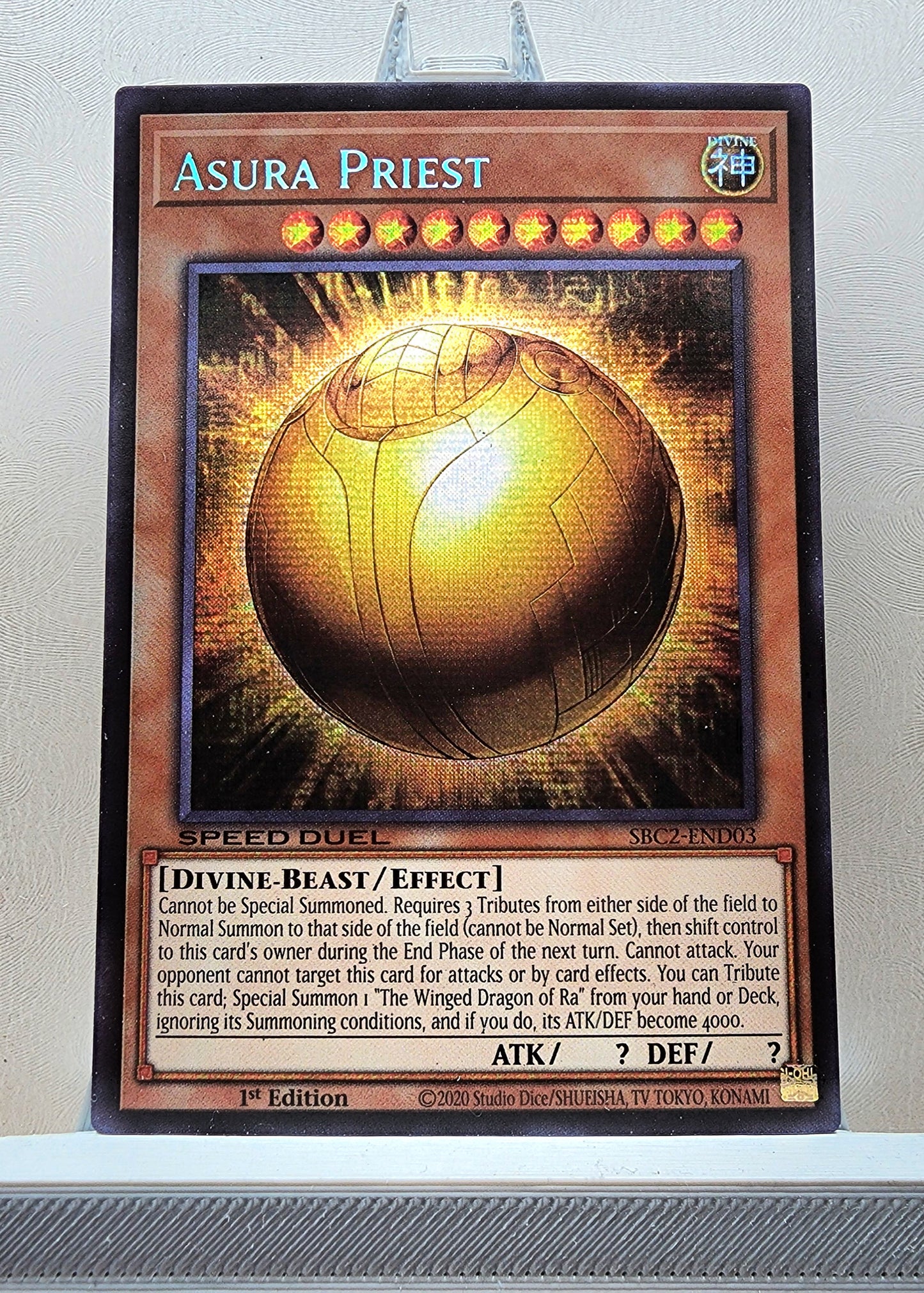 Yugioh! 1x MISPRINT The Winged Dragon of Ra - Sphere Mode Wrong Name Asura Priest (SBC2 - Prismatic Secret Rare) 1st Edition